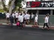  بالفيديو: مسيرة استفزازية للمستوطنين بيافا بمناسبة ادخال "سفر التوراة"